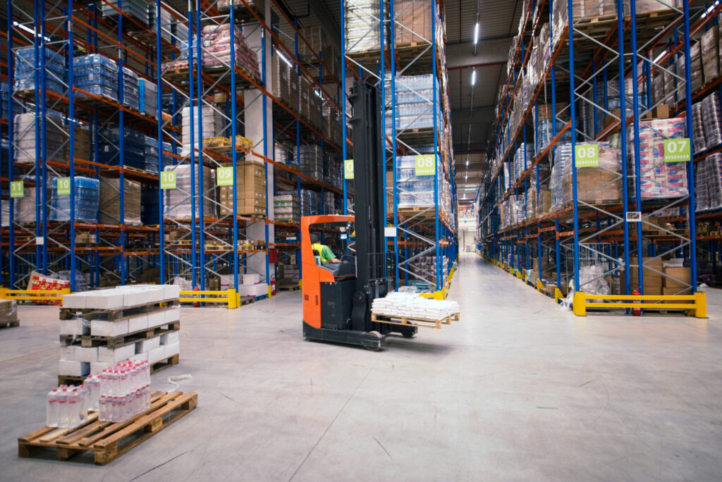 industrial-building-large-warehouse-interior-with-forklift-palette-with-goods-shelves